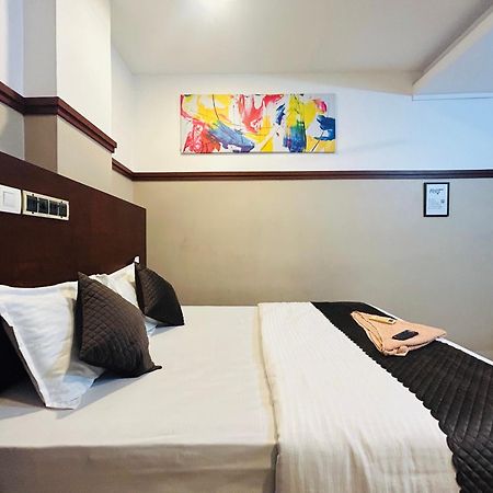 Rio Rooms Medical College Kozhikode Bagian luar foto